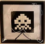 Space Invaders in white marble and black by Rolf Gruyters